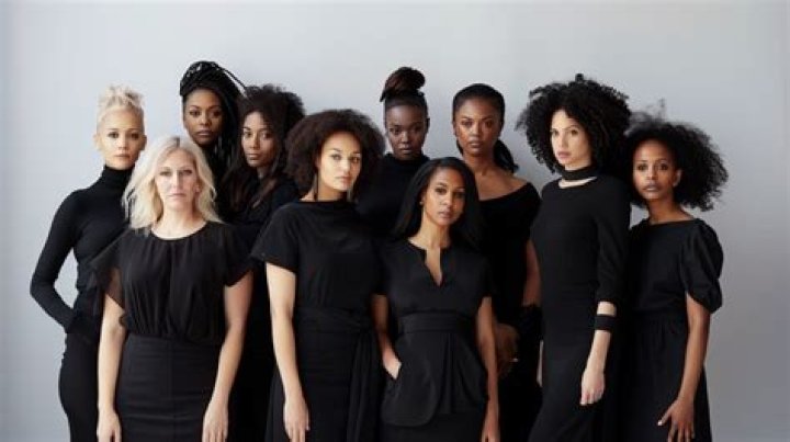A diverse group of women using makeup premium image by