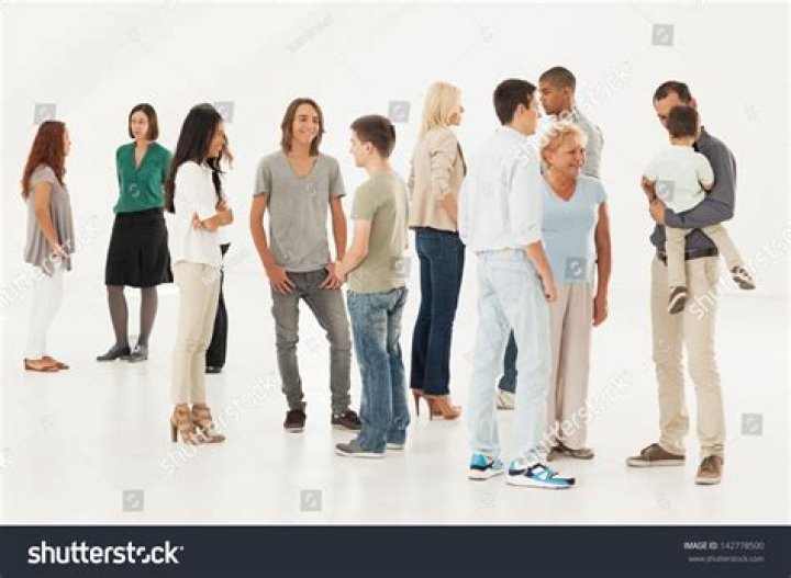 a group of people standing next to each other