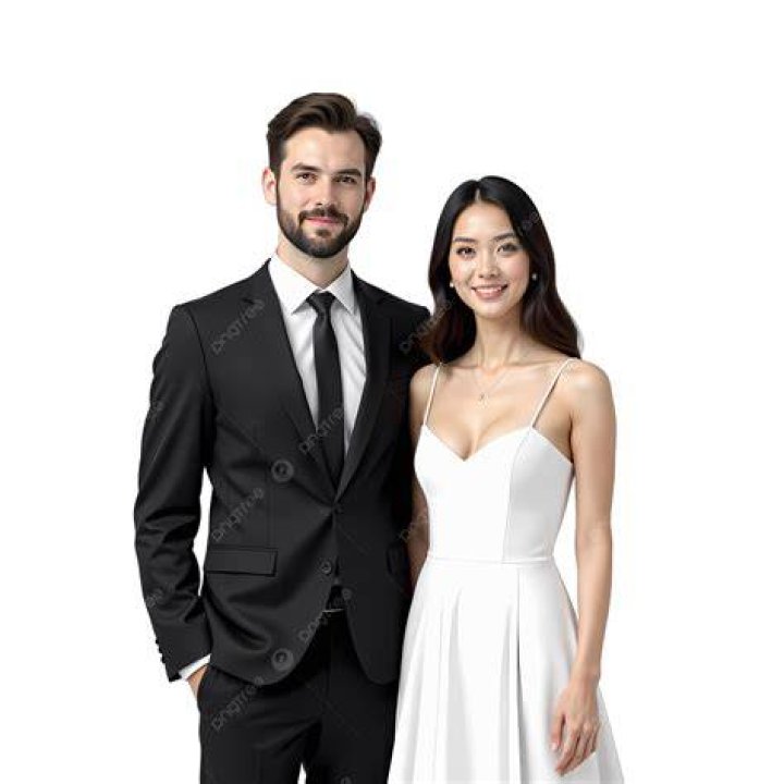 a man and woman posing on the red carpet at rock'n roll music festival