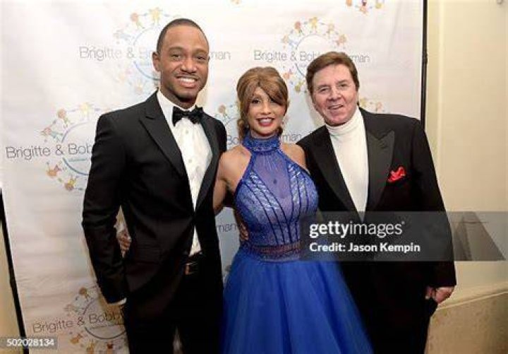 Actor Terrence J , Brigitte Sherman, and singer Bobby Sherman attend