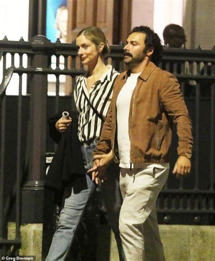 Aidan Turner steps out with wife Caitlin Fitzgerald who pushes pram