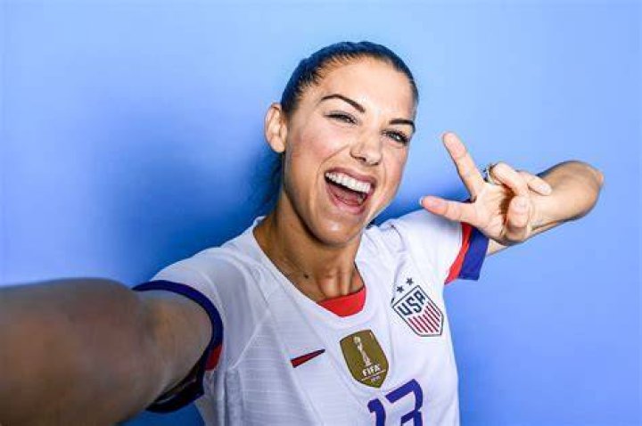 Alex 13, USWNT, with her daughter Charlie, USA vs Argentina