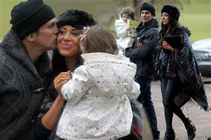 Alex Reid kisses daughter Dolly and fianc&eacute;e Nikki beauty is the
