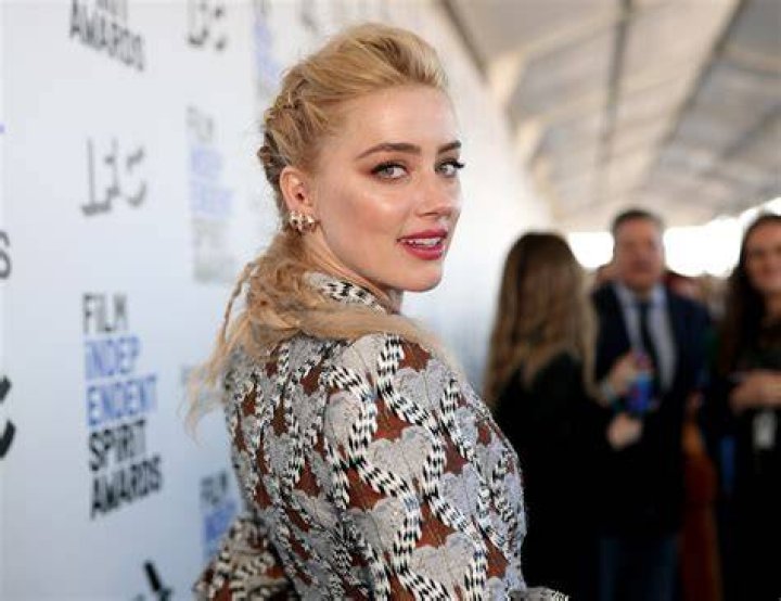 Amber Heard takes a swipe at Johnny Depp's former lawyer