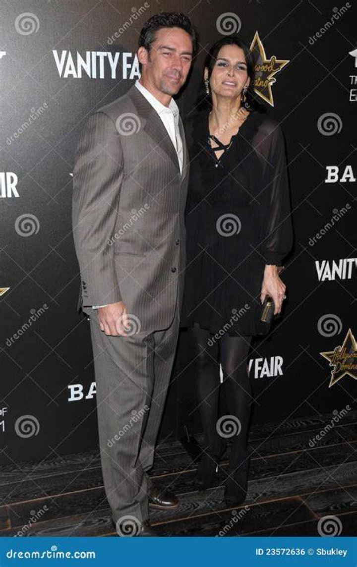 Angie Harmon with Jason Sehorn