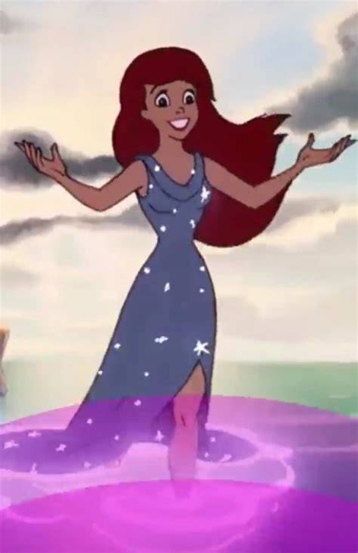 Ariel wearing a Shining Green dress rising out of water met. Eric