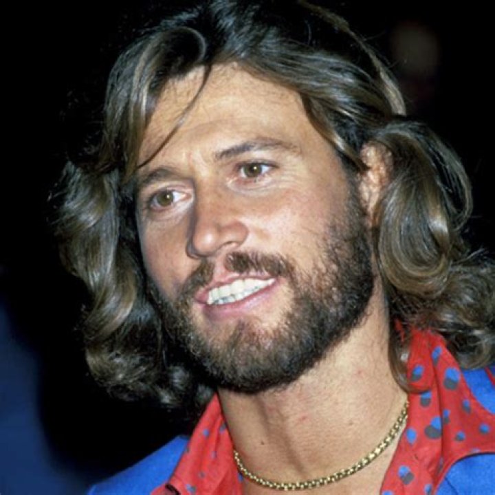 Barry Gibb, less the facial hair. He looks so much like his brother