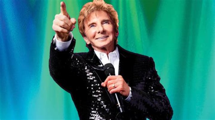 Barry Manilow 'out of surgery and doing well' but ordered not to 'talk