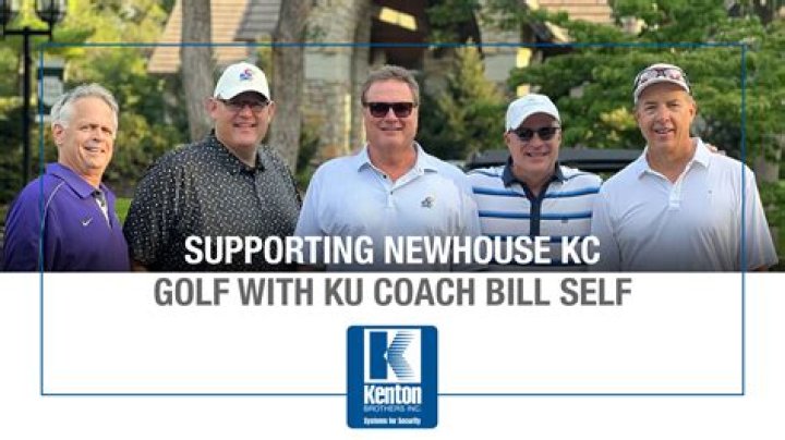 Bill Self congratulated by his wife Cindy at the Big 12 Tournament game