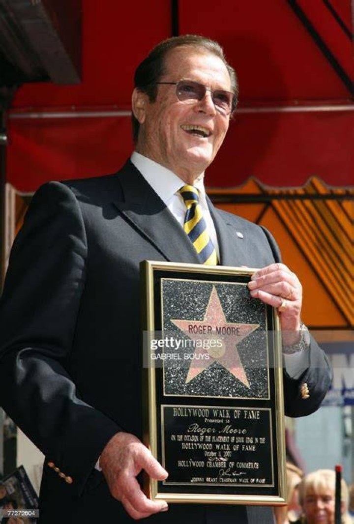 British actor Sir Roger Moore delivers a press conference in Buehl