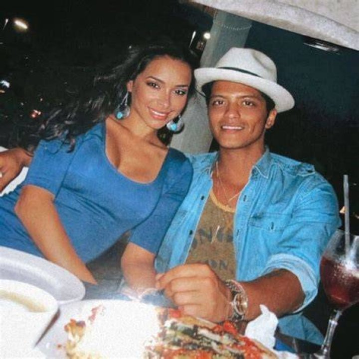 Bruno Mars & Jessica Caban from Grammys 2016 Candid Moments E! News