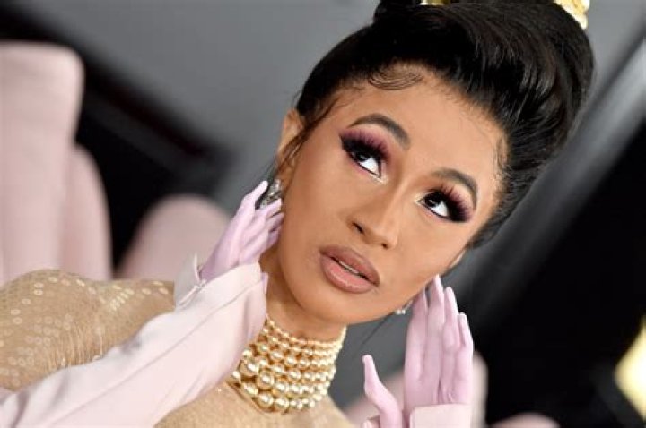 Cardi B says she hears a voice in her head