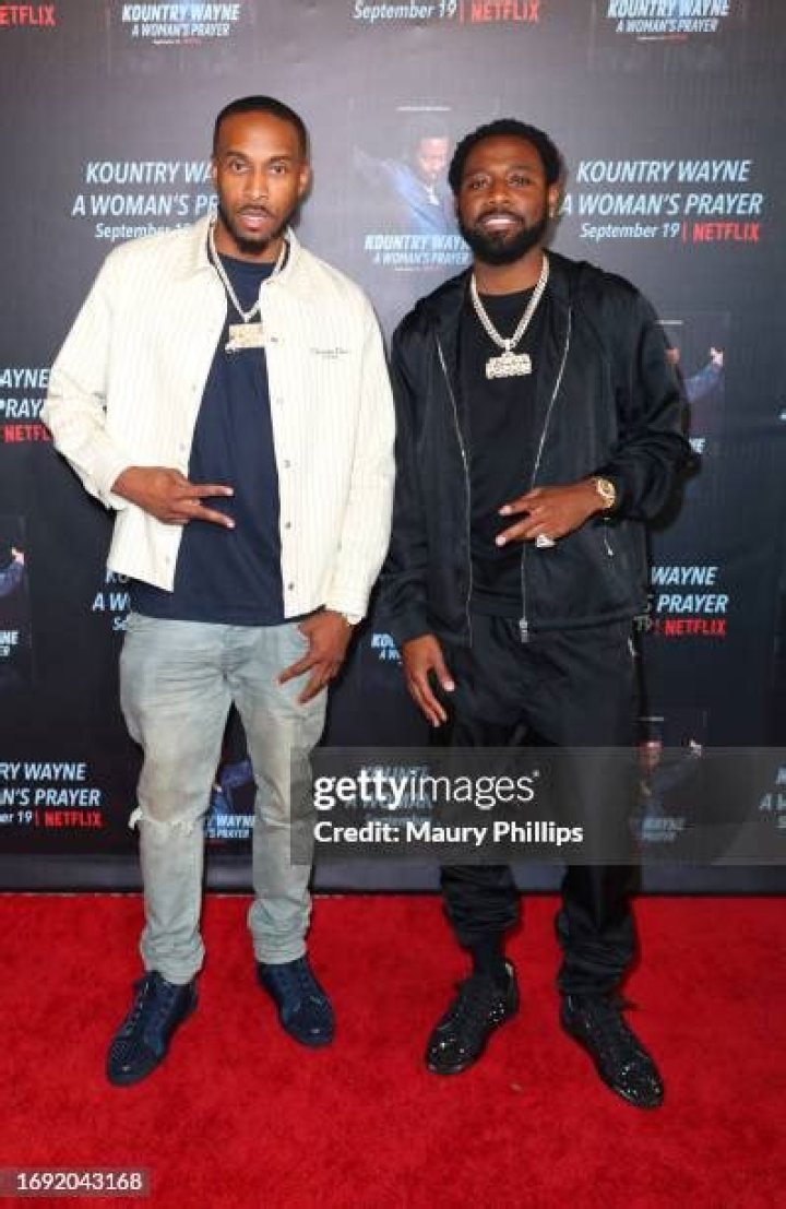 Chase Walker and Kountry Wayne attend the game between the Sacramento