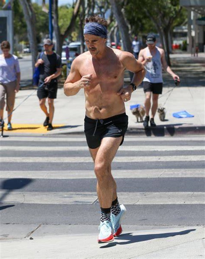 Colin Farrell shows off his hot bod as he goes shirtless for jog in LA