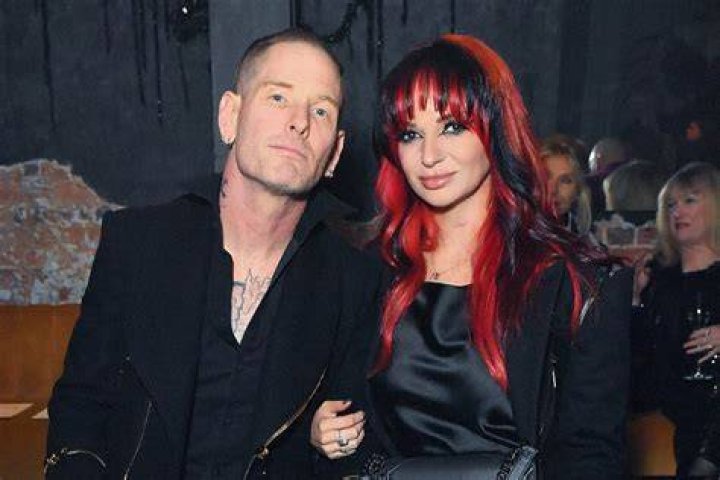 Corey Taylor and his wife , Stephanie Luby Taylor. photo style