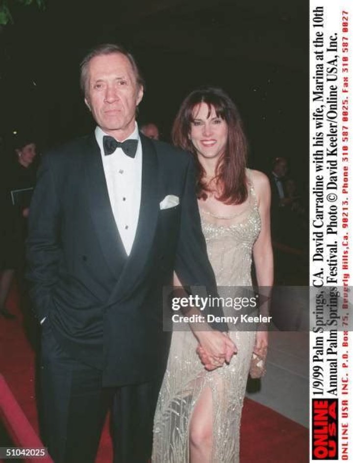 David Carradine posing with wife and kids at the "KILL BILL VOL.1