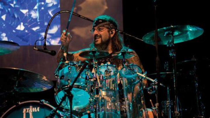 DRUMMER MIKE PORTNOY SAYS HE KNEW FOR "ABOUT TWO YEARS" THAT NEIL PEART