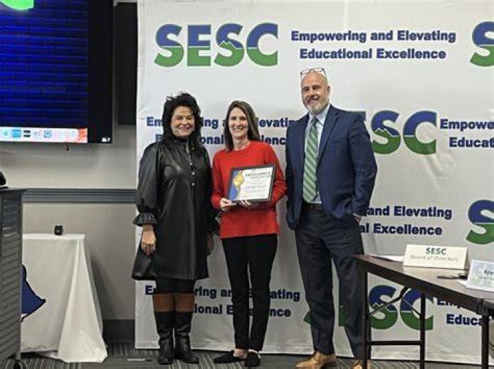 Educator honored with Excellence in Education award from Michigan