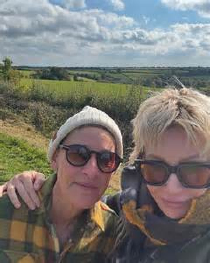 ELLEN DEGENERES and PORTIA DE ROSSI Take Photos of Each Other in Santa