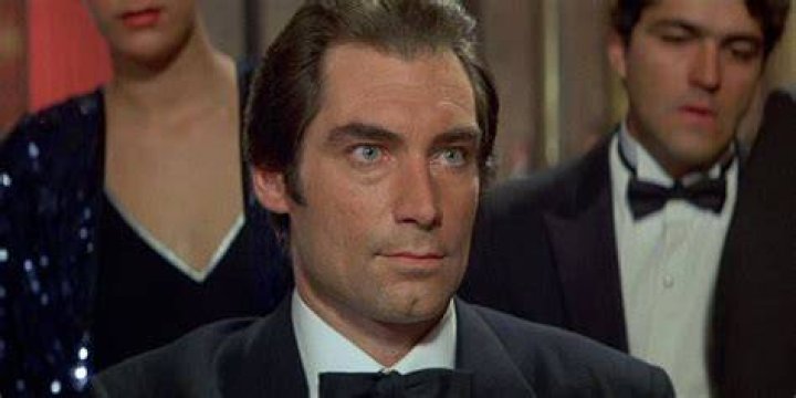 Former James Bond Timothy Dalton, 73, puts on an amorous display with a