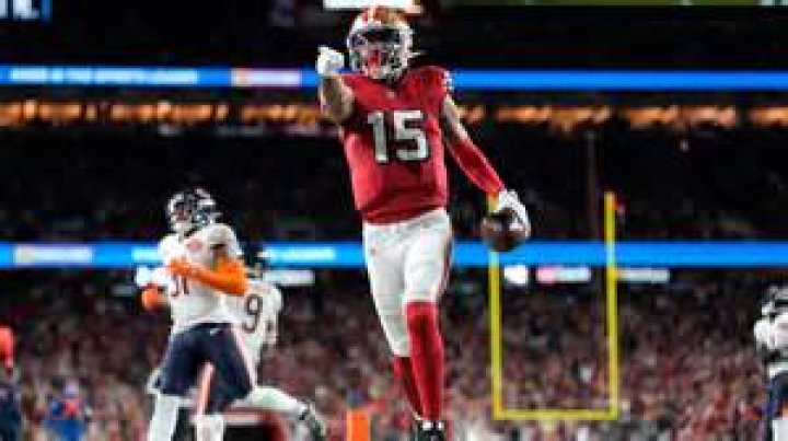 Marquise Goodwin parents: Tamina Goodwin 1 goodwin praying td usatsi