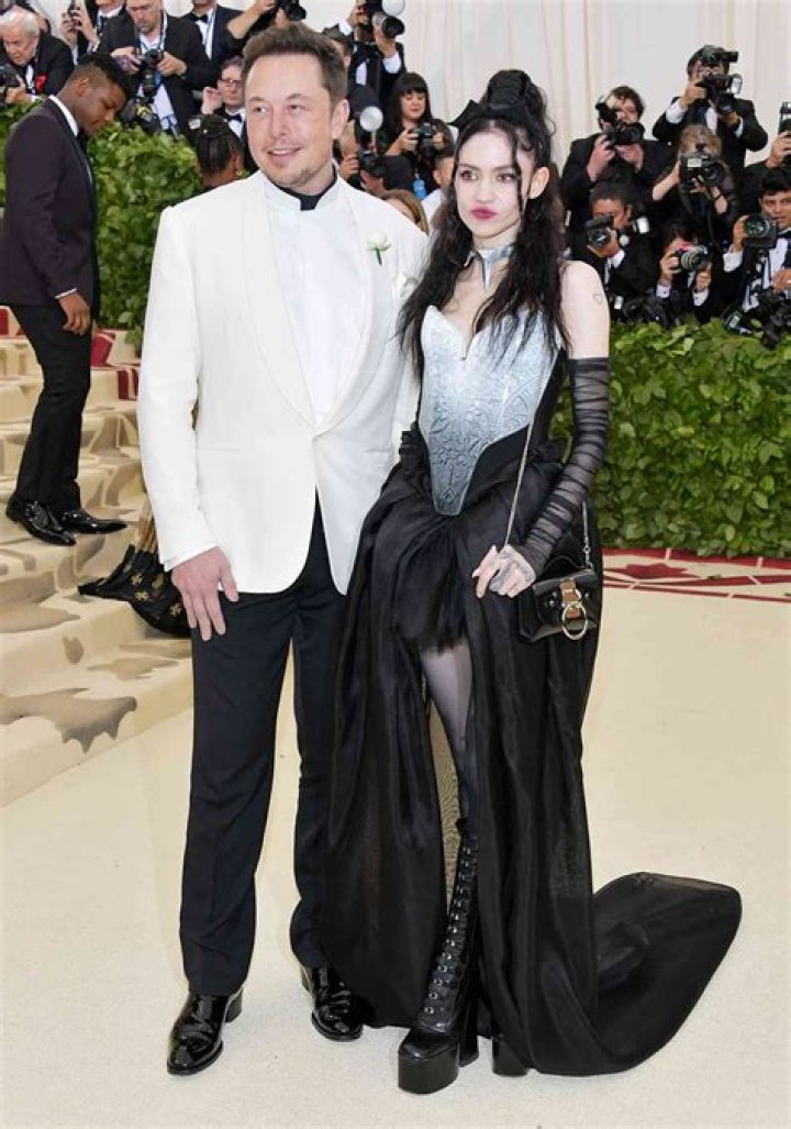 Grimes Announces She's 'Knocked Up' and Shares Photo of Her Pregnant Belly