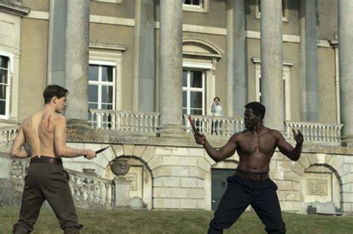 Harris Dickinson with Djimon Hounsou, Ralph Fiennes and Rhys Ifans Harris Dickinson with Djimon Hounsou, Ralph Fiennes and Rhys Ifans