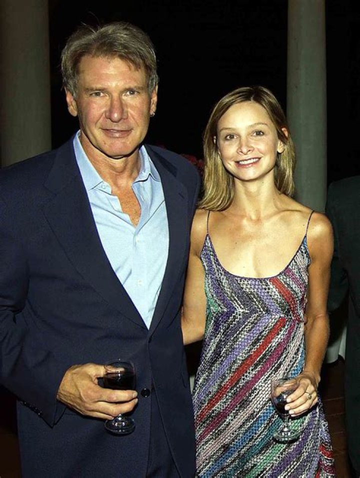 Harrison Ford and Calista Flockhart take their son Liam to a Lakers