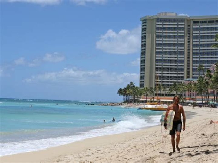 Hawaii shark attack Surfer, 58, in serious condition after being