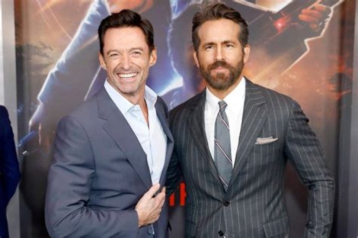 Hugh Jackman Shows Off Muscles and Teases Costar Ryan Reynolds During