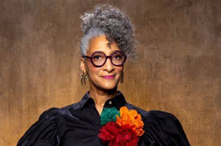 Image of Carla Hall with her husband Mathew Lyons and son Noah Lyons