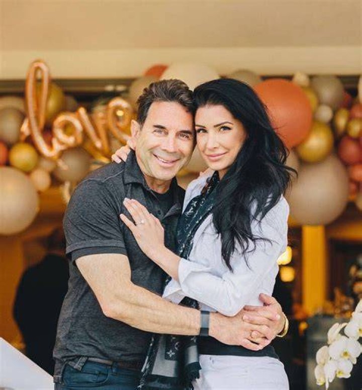 Image ofDr. Paul Nassif engaged with Brittany Pattakos