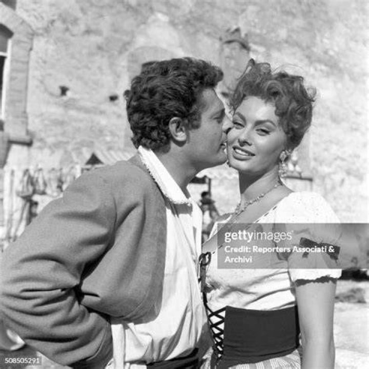 Italian actress Sophia Loren and her mother at the Christian Dior fur