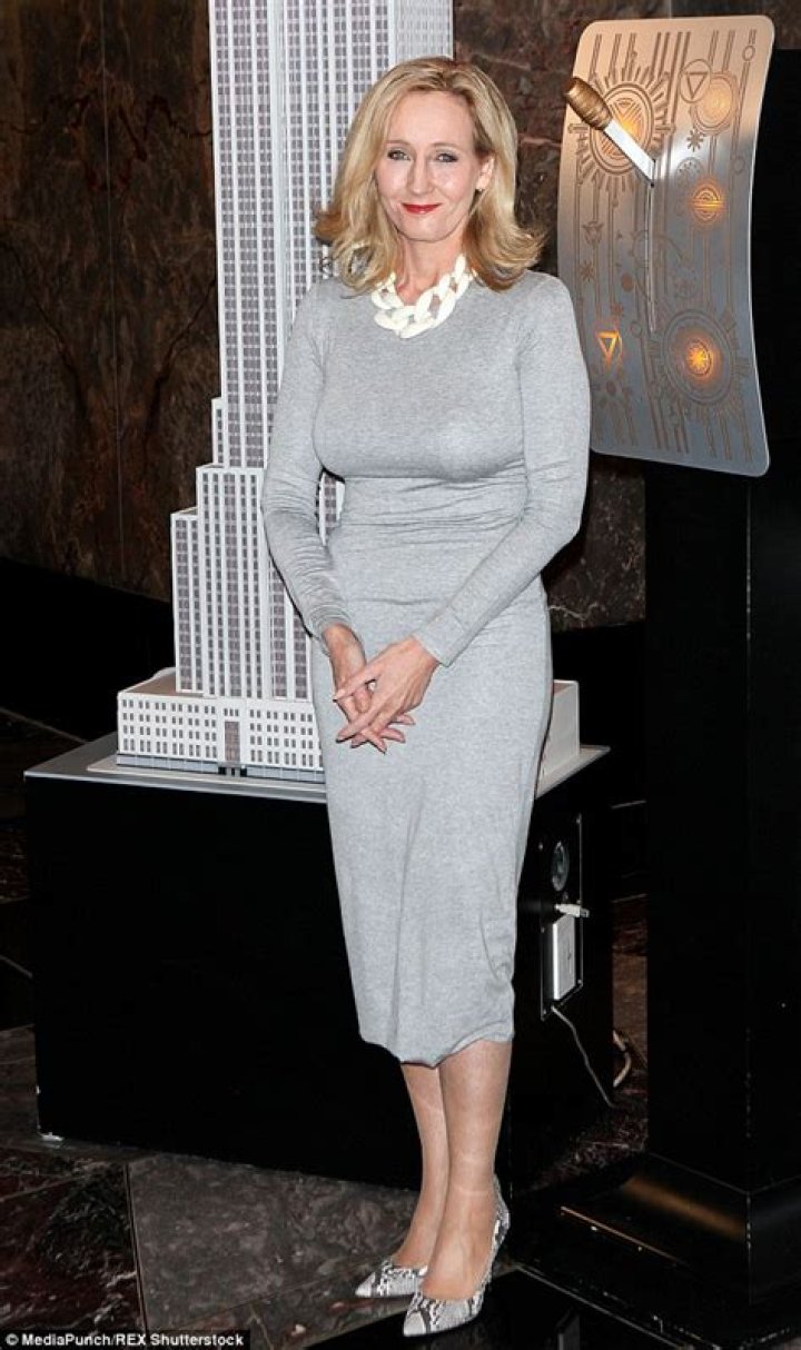 J K Rowling looks chic in green with husband Neil Michael Murray at