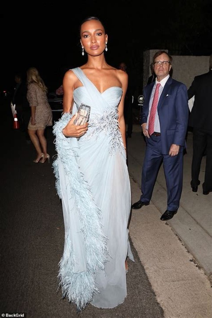 Jasmine Tookes amps up the glamour in a powder blue ballgown