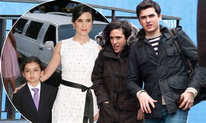 Jennifer Connelly is dwarfed by her teenage son as they walk through