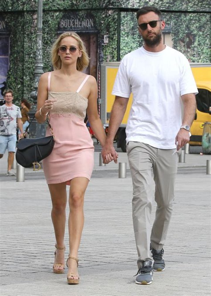Jennifer Lawrence and boyfriend Cooke Maroney hold hands
