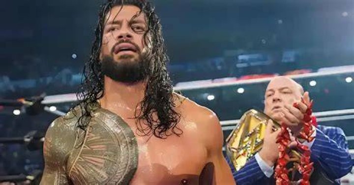 Joe Anoa'i and his wife Galina Anoa'i Roman reigns wife