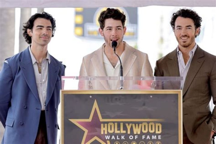 Jonas Brothers inducted into Hollywood Walk of Fame with their wives by