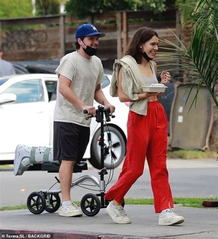 Josh Hutcherson rolls along on a knee walker on lunch stroll in LA with