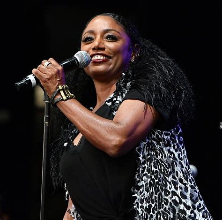 Karyn White Is Now 54 and Stuns with Her Natural Beauty in White Outfit
