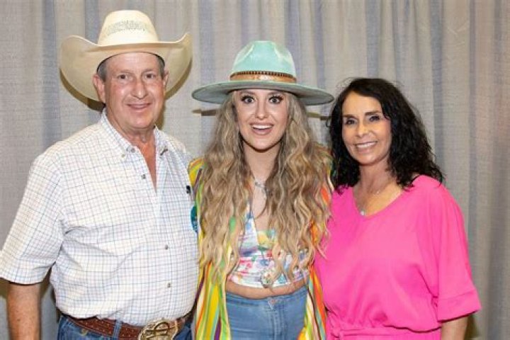 Lainey Wilson with her parents Brian Wilson and Michelle Wilson Stock