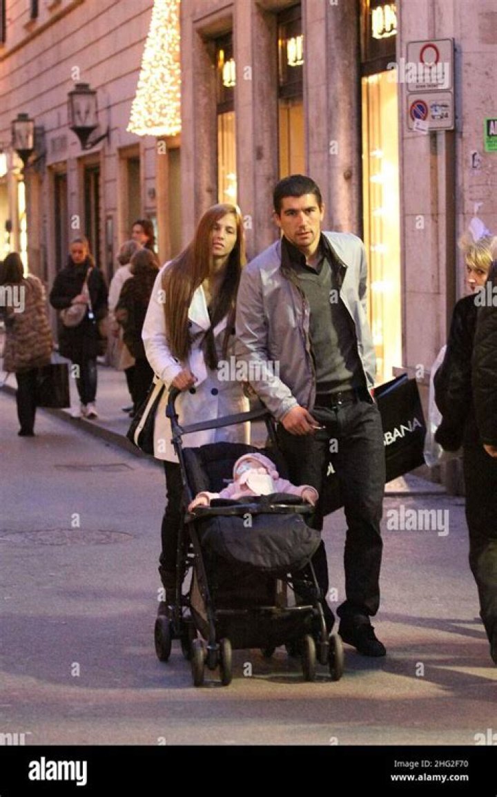 Lazio soccer player , Alexander Kolarov, walking around with wife Vesna