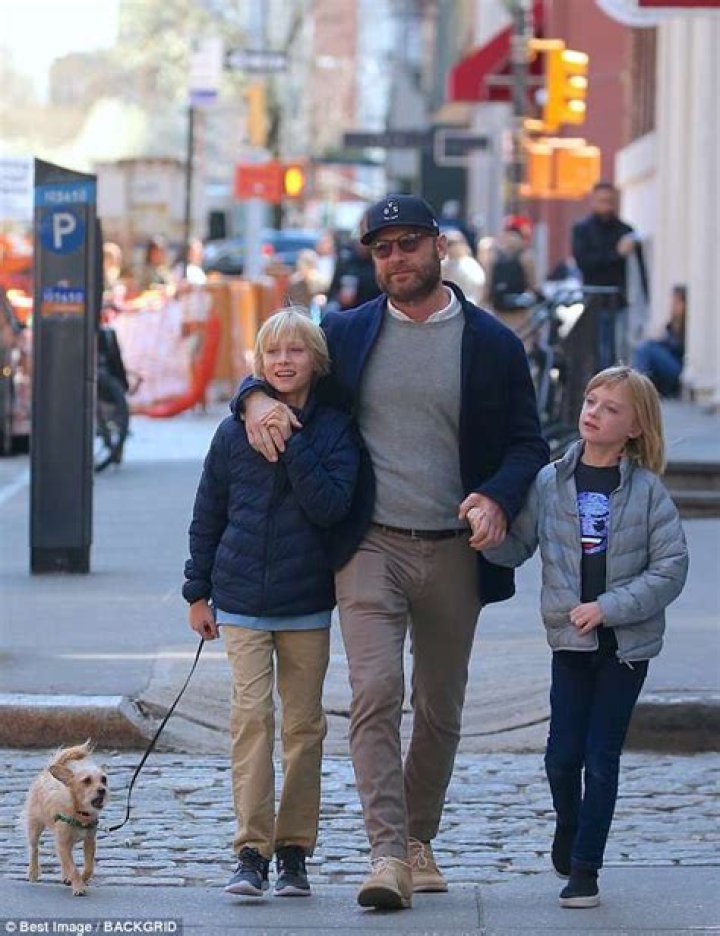 Liev Schreiber plays doting dad as he enjoys family day out with two
