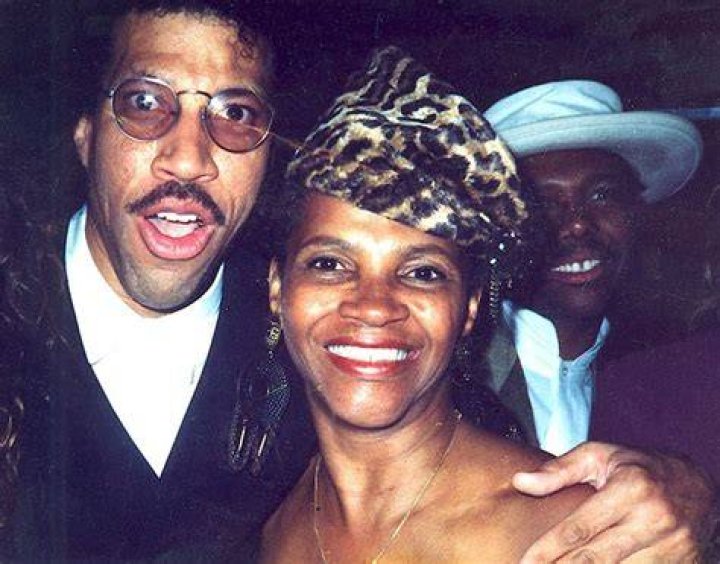 Lionel Richie, Mom (she loves her animal prints), and me A Real
