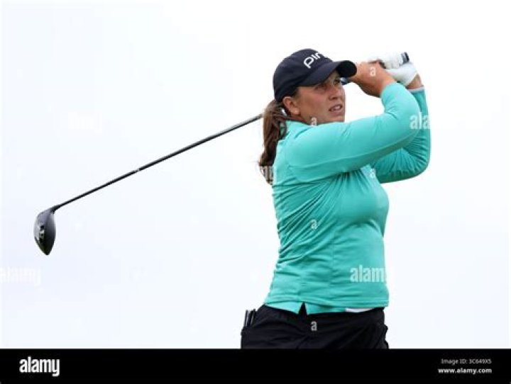 Liz Young of England on the 18th hole with her husband Jon… Flickr