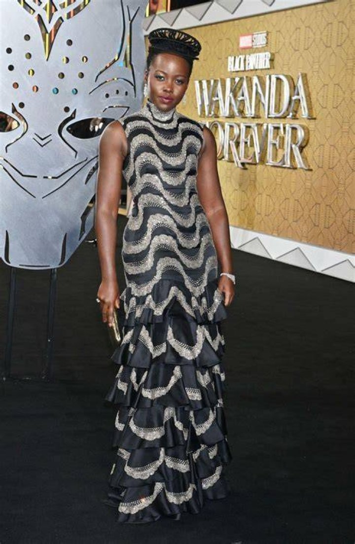 Lupita Nyong'o Delivers a Royal Fashion Moment in Stunning Purple Gown