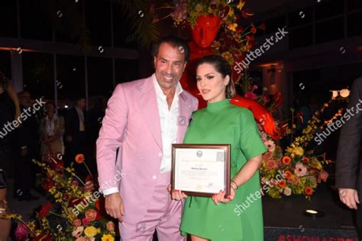 Masoud Shojaee Stephanie Shojaee Holding Congratulations Editorial