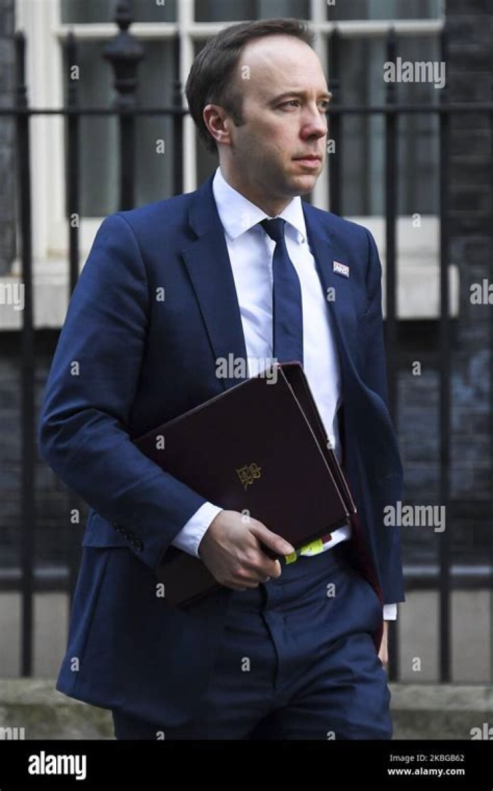 Matt Hancock, Britain's beleaguered health secretary, apologizes after