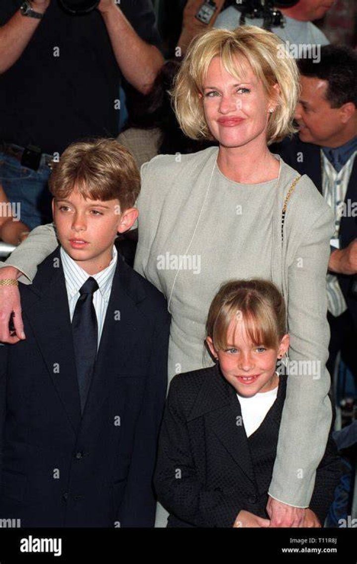 Melanie Griffith and longhaired son Alexander Bauer are all smiles